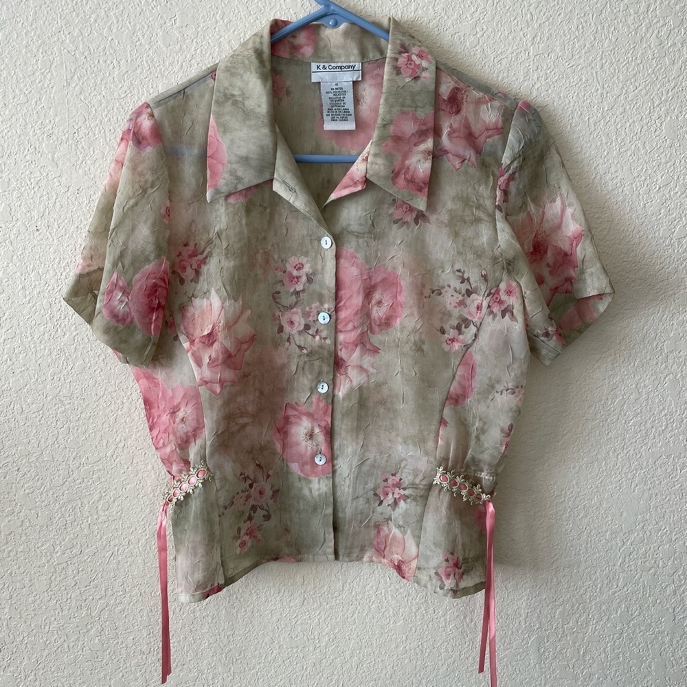 Gorgeous light green with pink roses detailed throughout blouse.